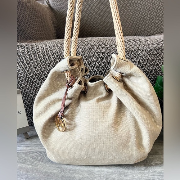 Michael Kors Marina Gathered Drawstring Gold Metallic Shimmer Hobo Shoulder Bag. - Picture 3 of 15